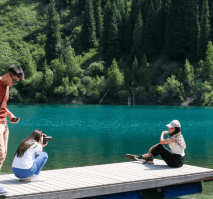 Kayaking Across the Turquoise Waters of Lake Kaindy