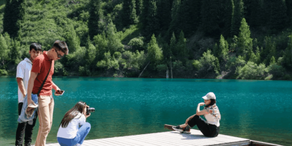 Kayaking Across the Turquoise Waters of Lake Kaindy